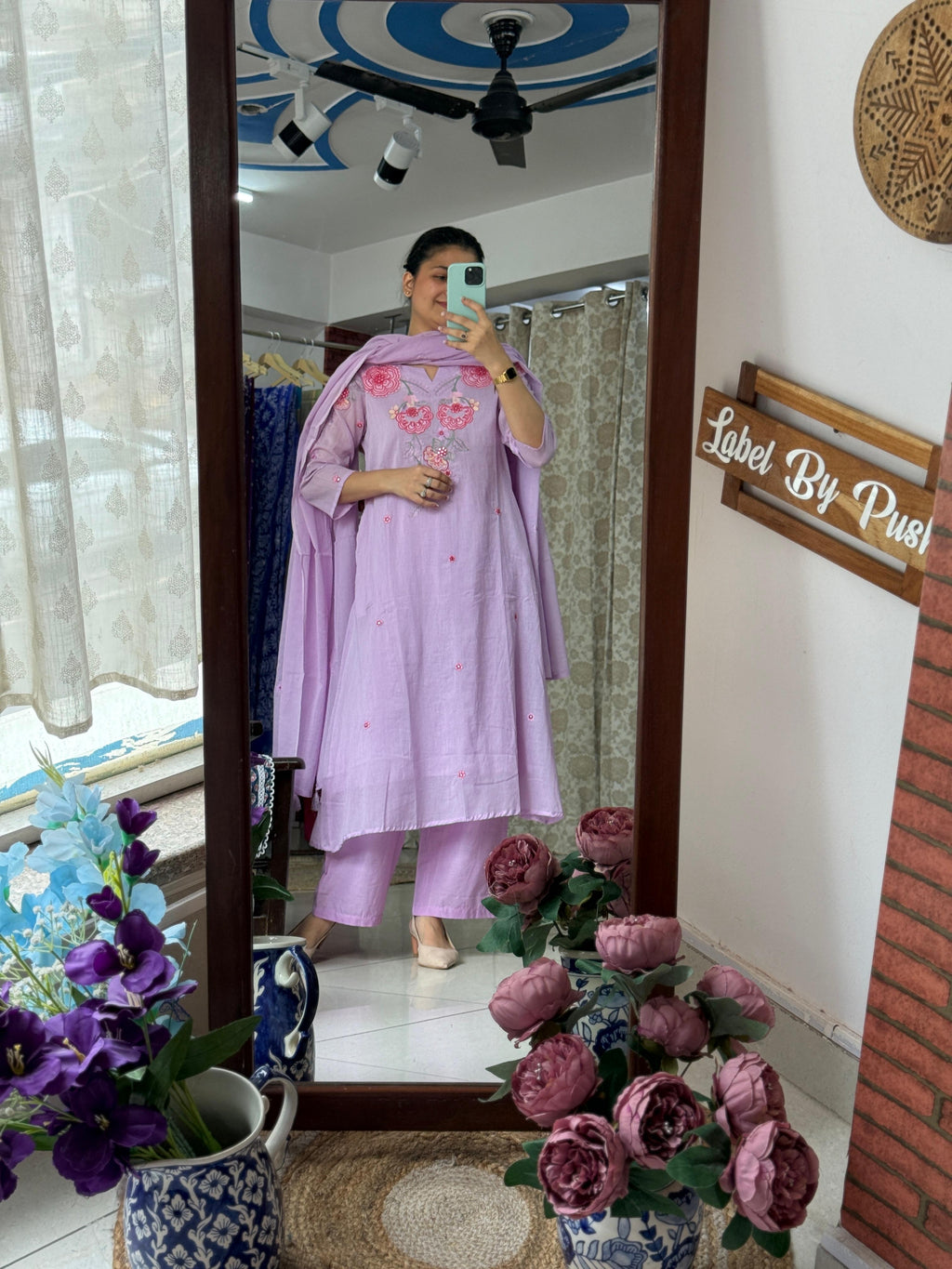 Woman wearing Kasak lavender mul cotton suit set with mul cotton lining, embroidered sleeves, matching pants and dupatta by Label by Pushp